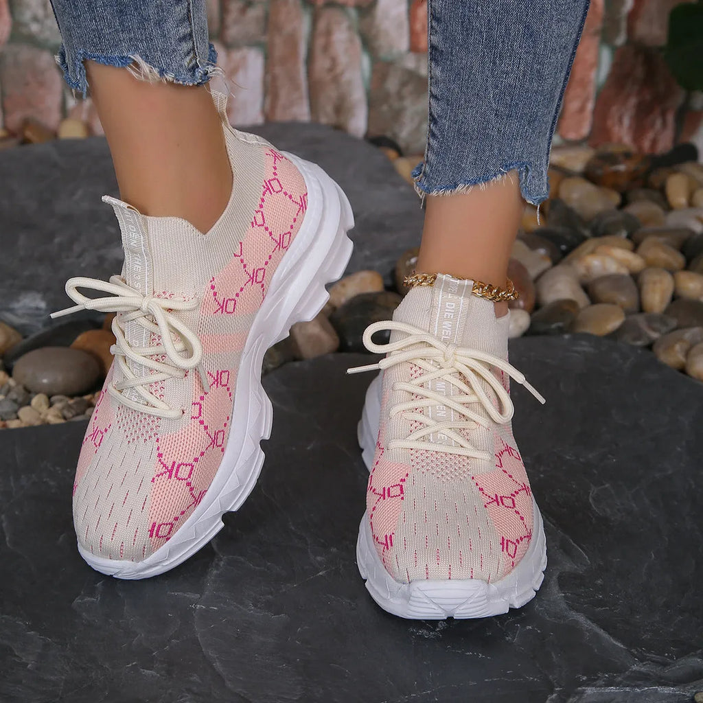Women's breathable mesh lace up flat sneakers in light brown with rubber sole and round toe