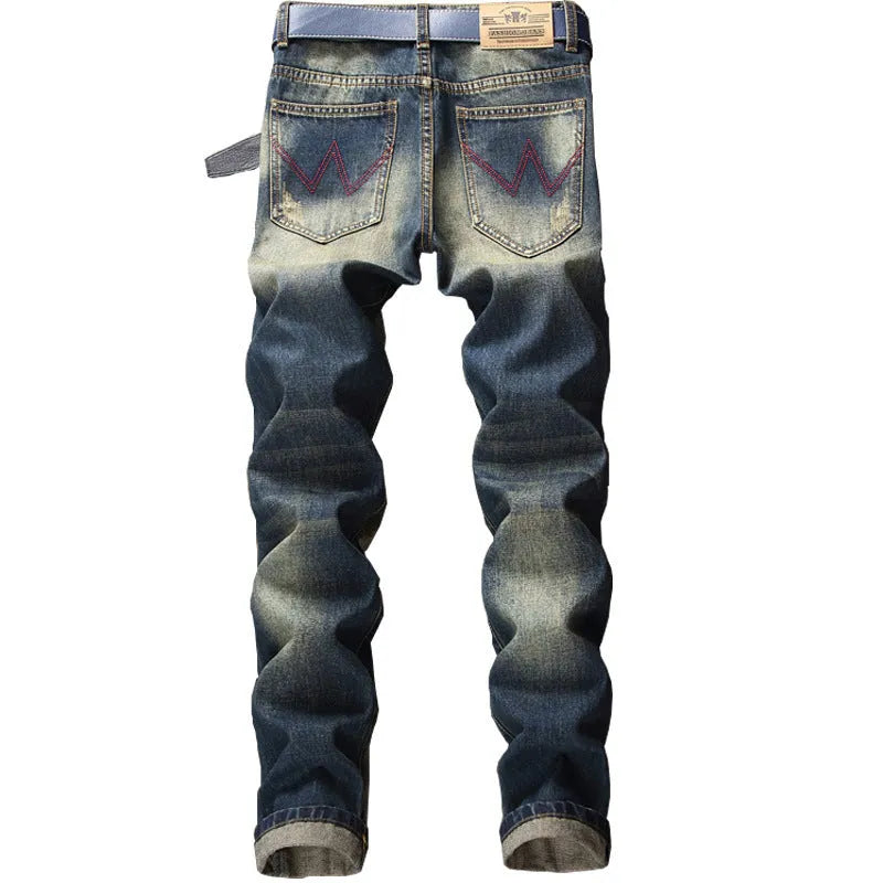 Shabby nostalgic straight leg dark blue jeans with worn wash effect on denim fabric, mid waist, zip fly closure
