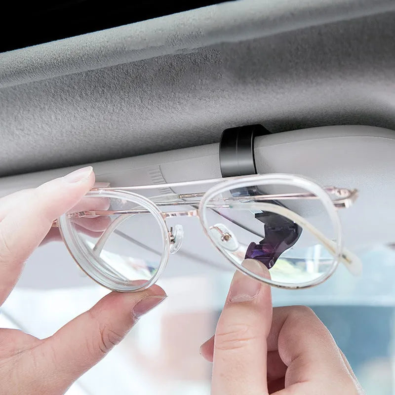 Black plastic car sunshade clip for glasses and cards measuring 6.5cm