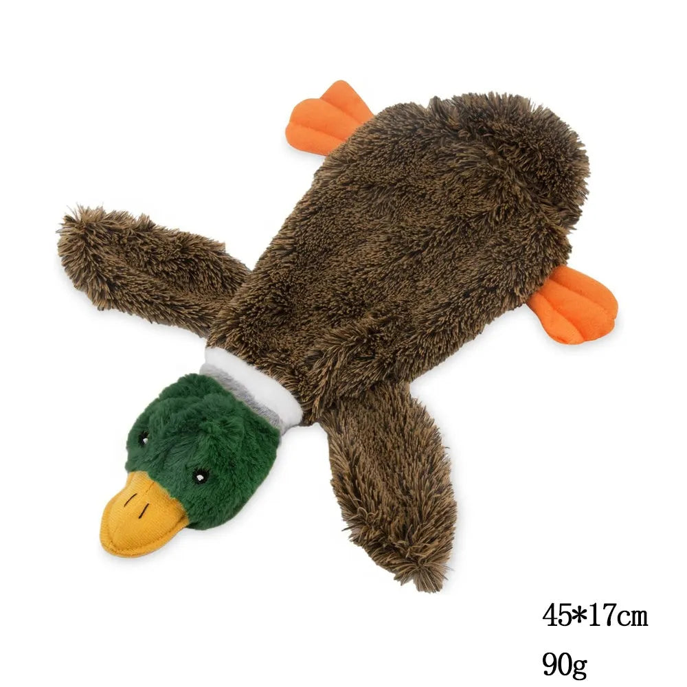 Green stuffless plush dog toy shaped like a wild duck with a squeaker in head and tail.