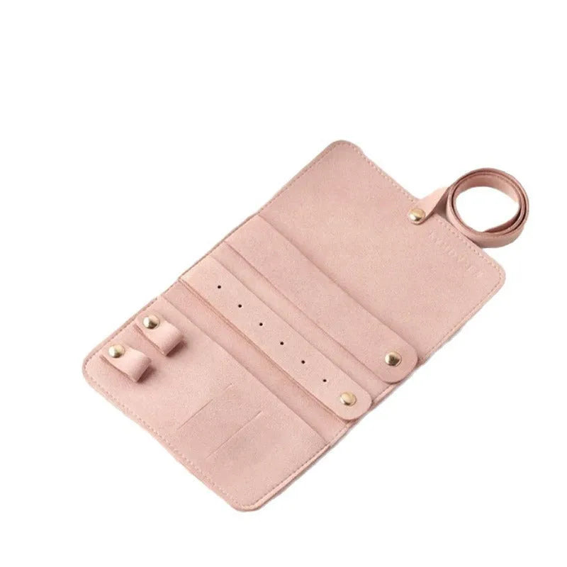 Soft brown leather jewellery storage pouch for earrings and rings, shown at 12cm square size.