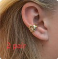 Gold colour starfish and scallop design drop earrings for women.