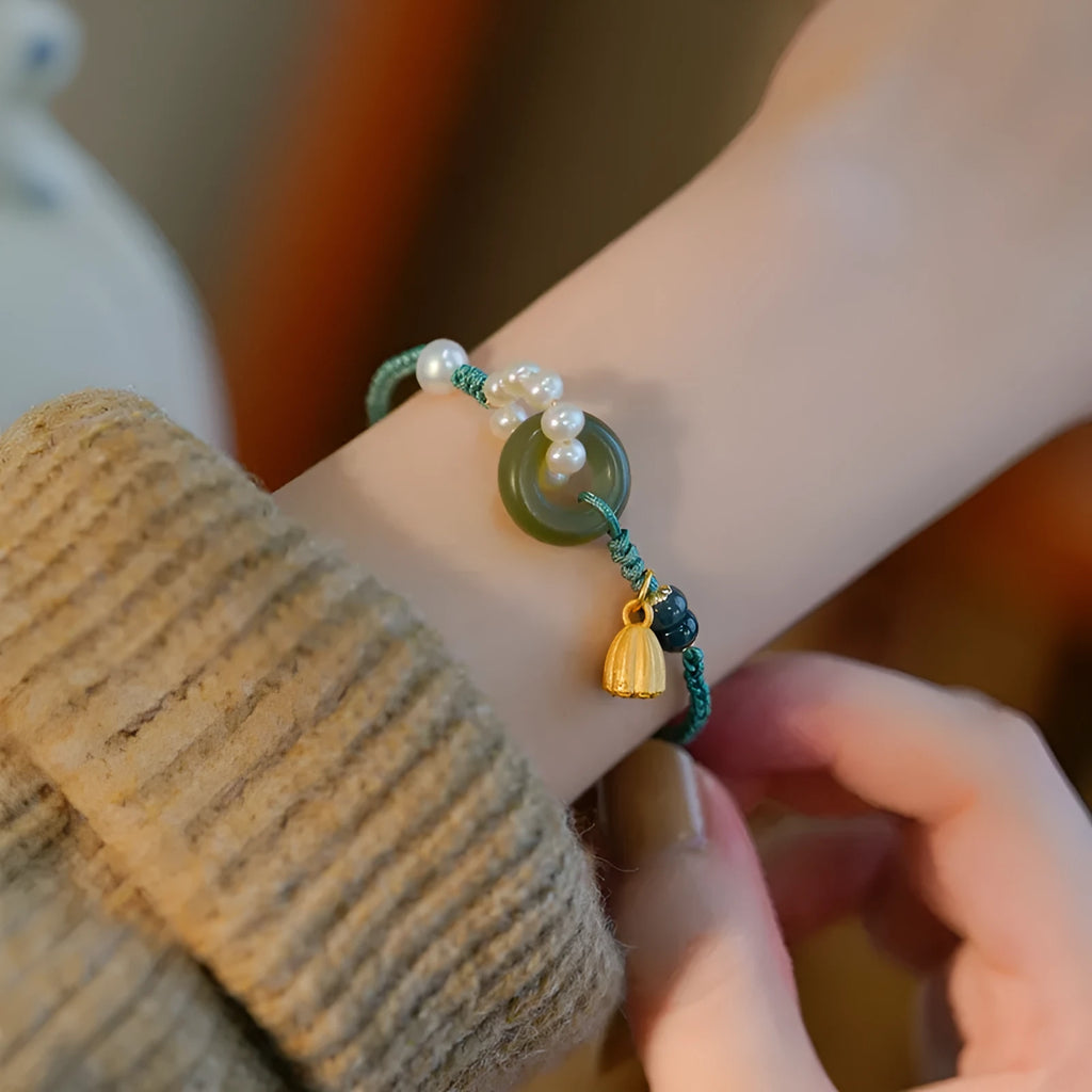 Hand-woven flexible wire watch band with Pearl Peace Buckle and round jade pearl decoration