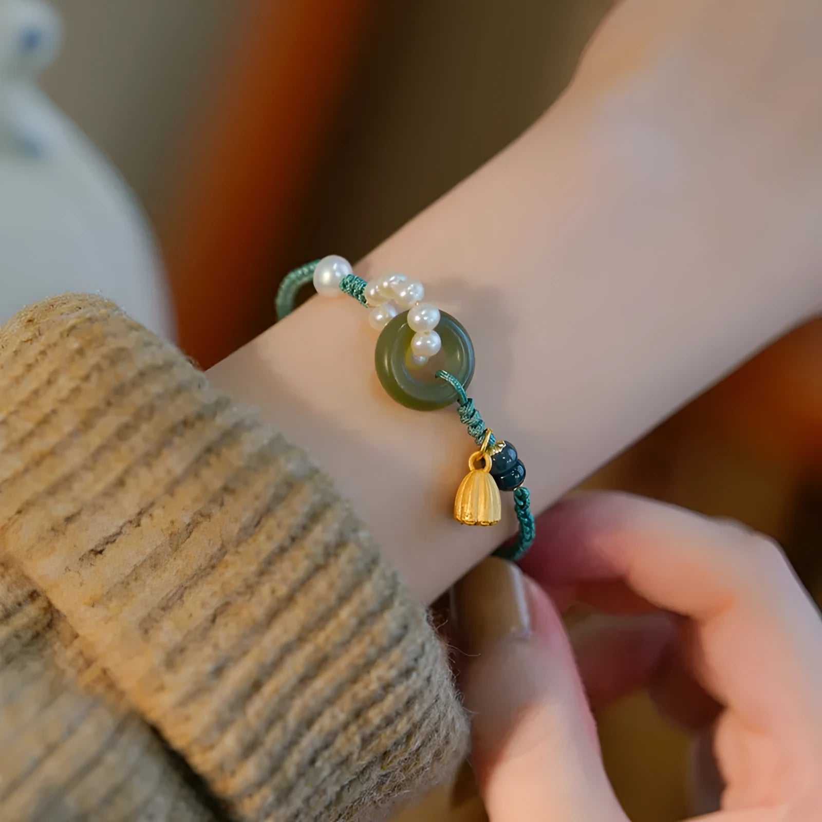 Hand-woven flexible wire watch band with Pearl Peace Buckle and round jade pearl decoration