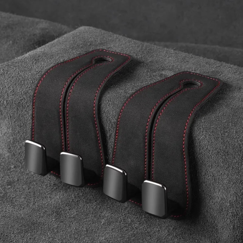 Car seat hook with flip-up mechanism in suede covering, shown in black colour