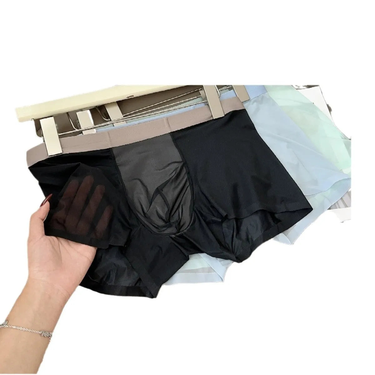 Ultra-thin nude colour men's boxers with antibacterial honeycomb crotch in ice silk fabric.