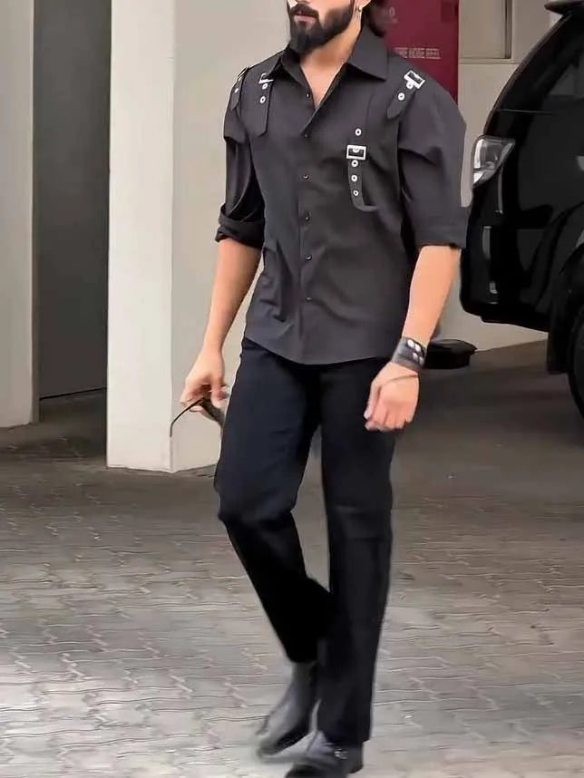 Black men's utility-style button-up shirt with a regular fit on a mannequin.