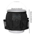 Black cylindrical polyester storage bag with straps hanging from a 5 gallon bucket.