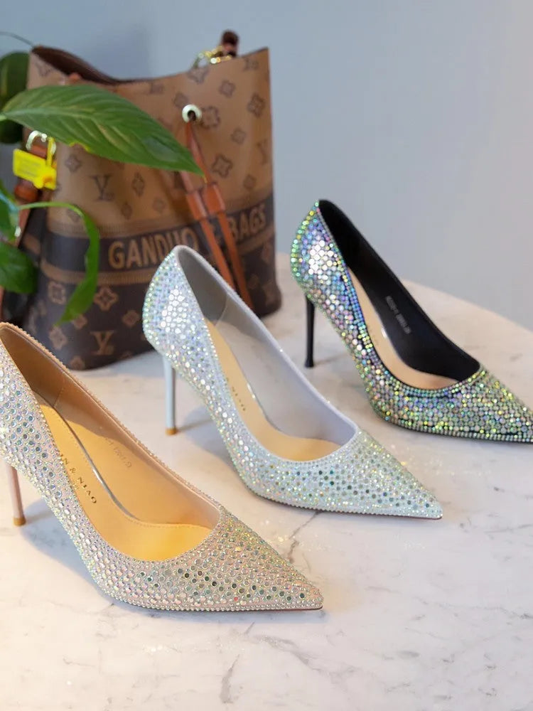 Women's black diamond bird banquet pumps with pointed stiletto heel and PU upper
