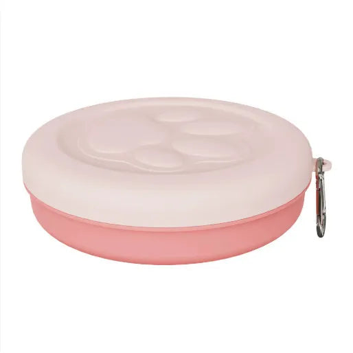 Portable dog feeding bowl shown in light pink and green colour options, suitable for food or water.