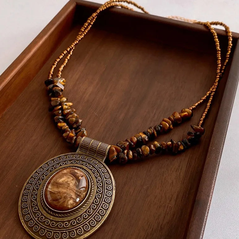 Irregular tiger eye stone oval pendant necklace with electroplated alloy chain, brown colour, clavicle length, retro antique style