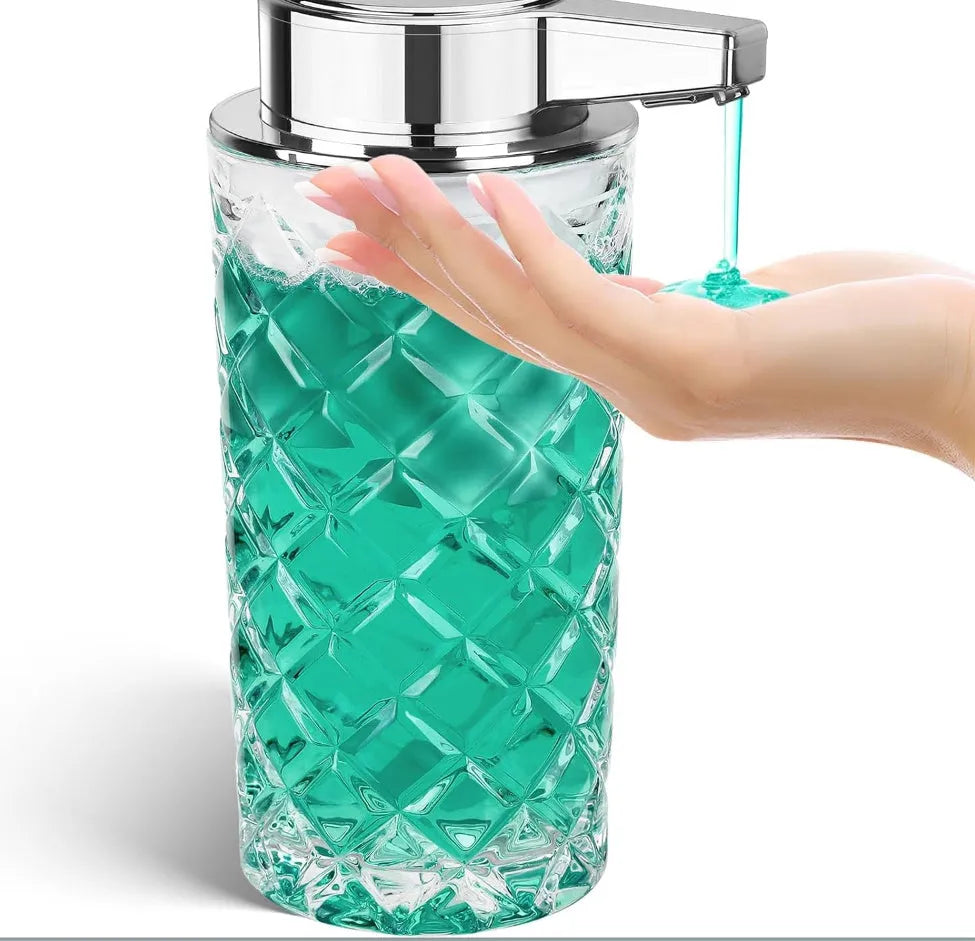 Silver automatic soap dispenser with sensor and USB-C charging port on a bathroom countertop