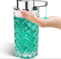 Silver automatic soap dispenser with sensor and USB-C charging port on a bathroom countertop