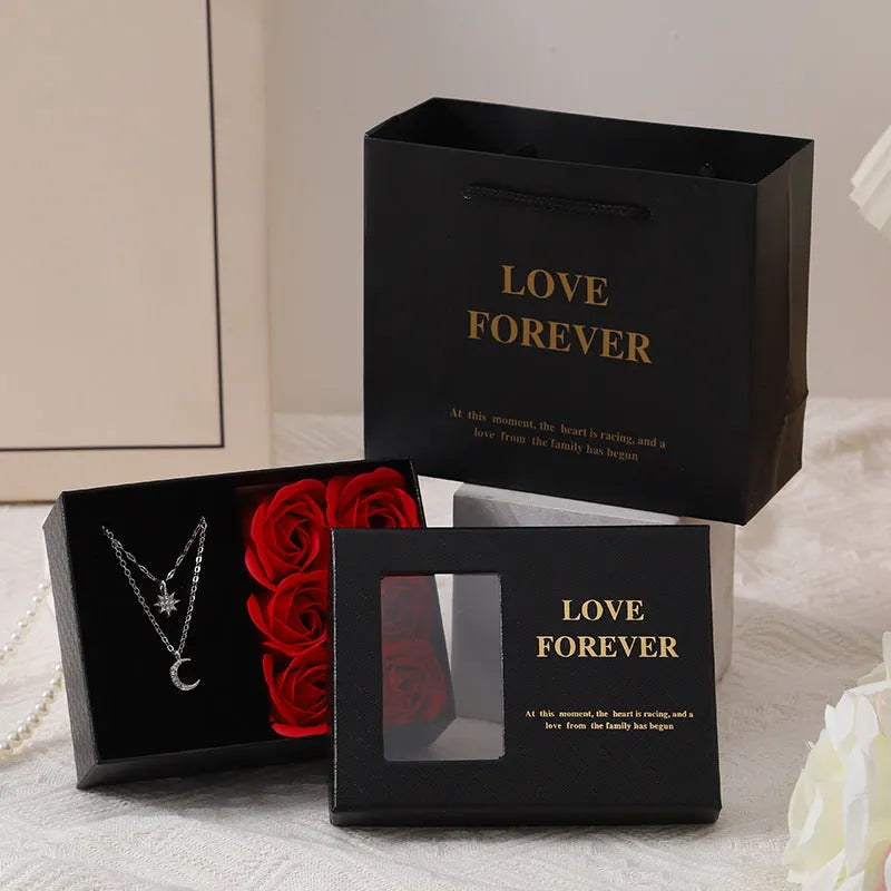 Korean style soap flower gift set with six red roses in a jewellery box, includes a handbag.