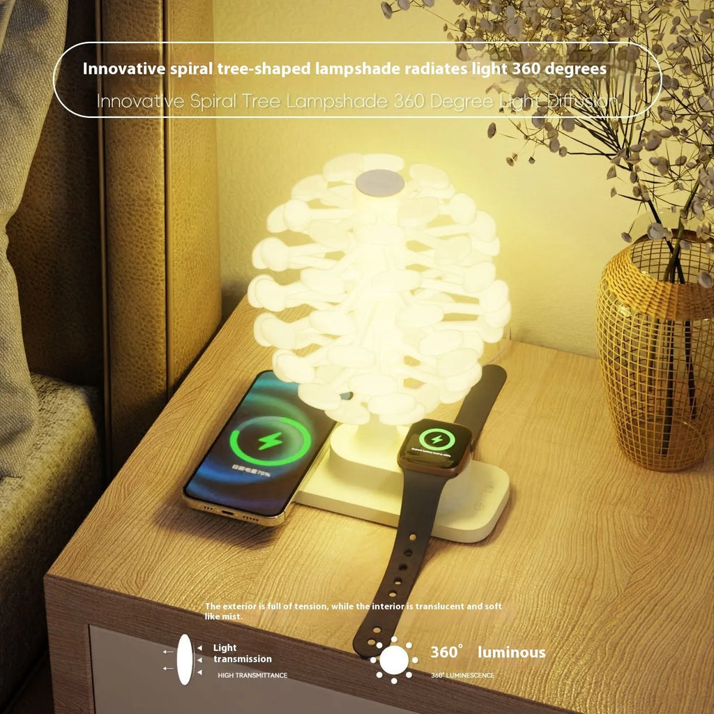 Modern geometric spiral tree shaped LED desk lamp on a wooden surface
