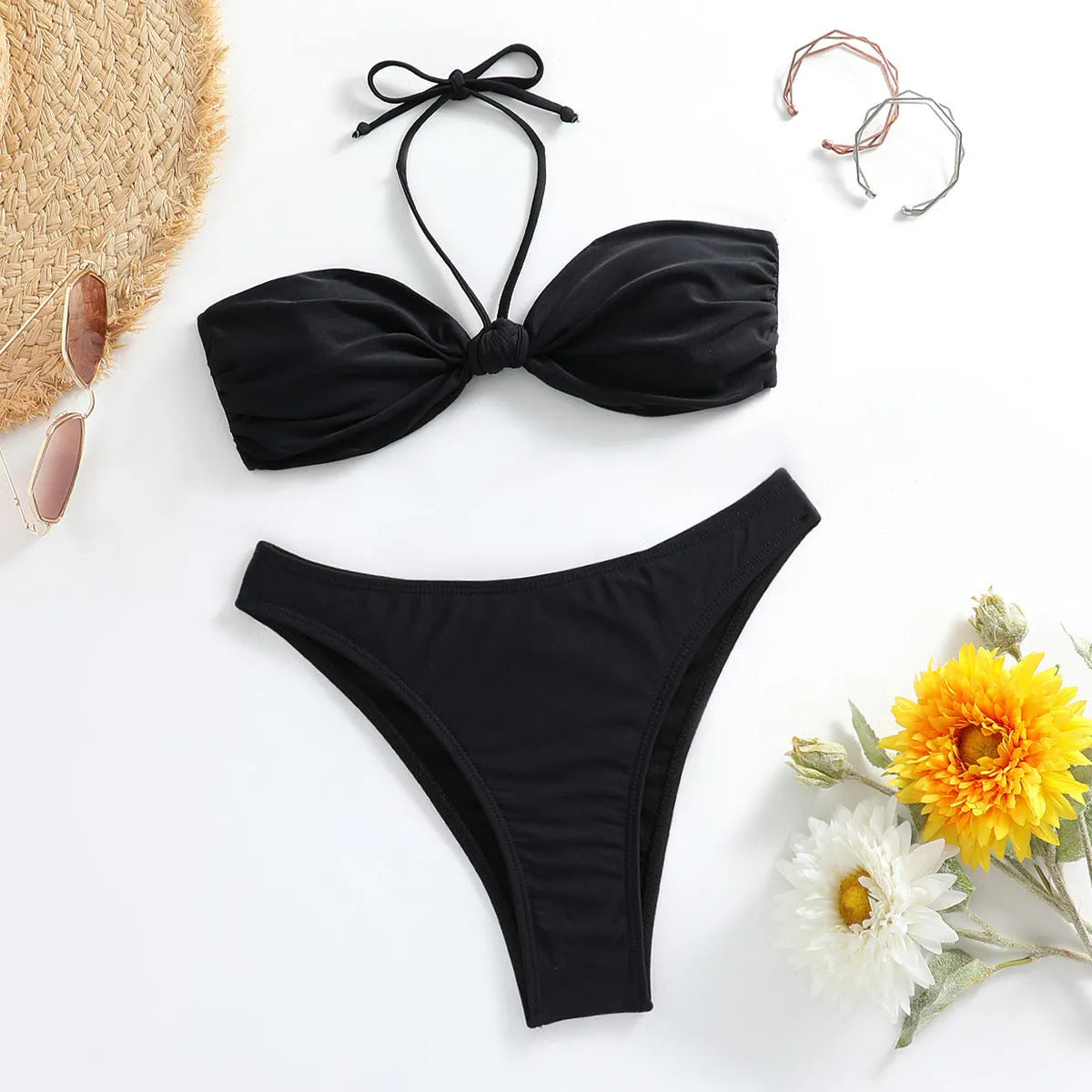 Black women's bikini set with lace-up tube top and matching briefs in polyester fabric