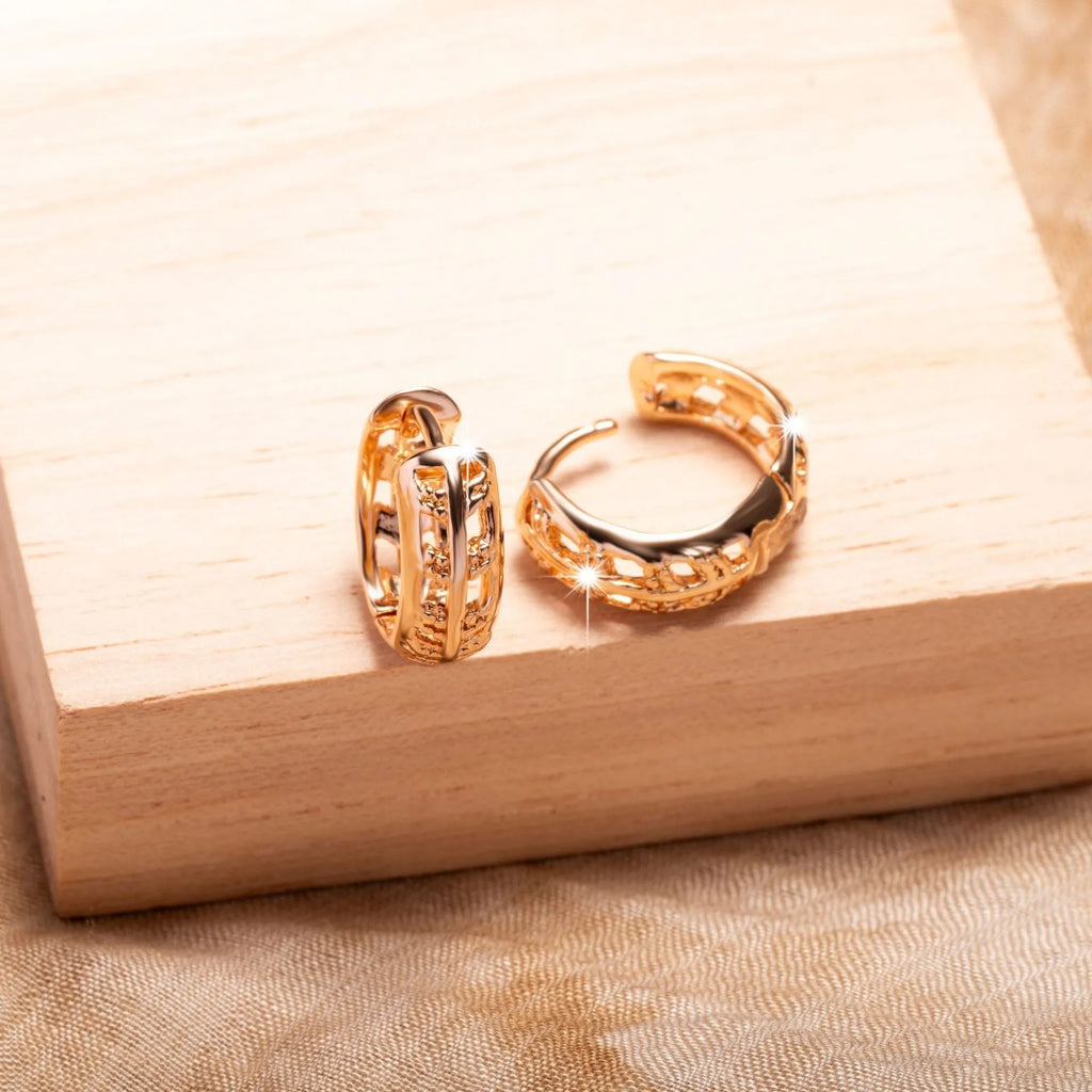 Rose gold hollowed-out copper earrings in heart and leaf shapes