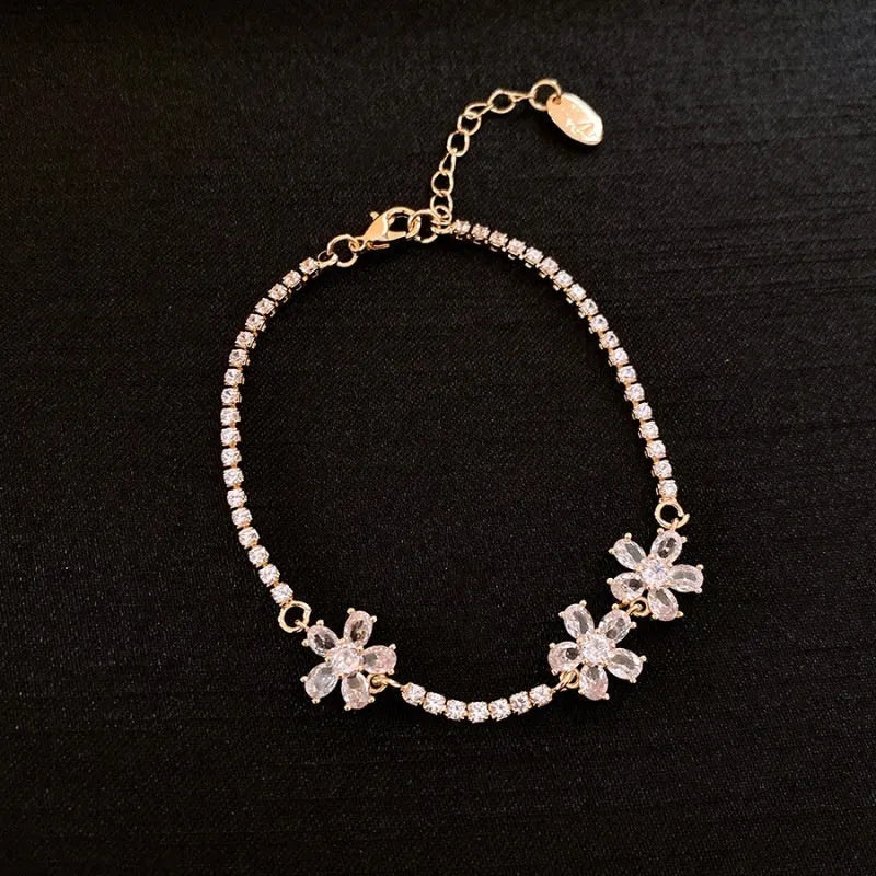 Gold geometric copper bracelet with inlaid zircon detail for women