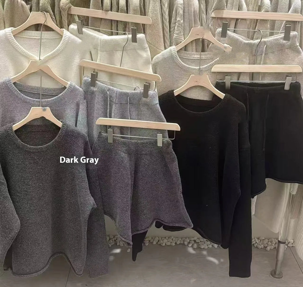 Women's loose-fitting long sleeve sweater and knitted wide leg shorts two-piece set in oatmeal colour.