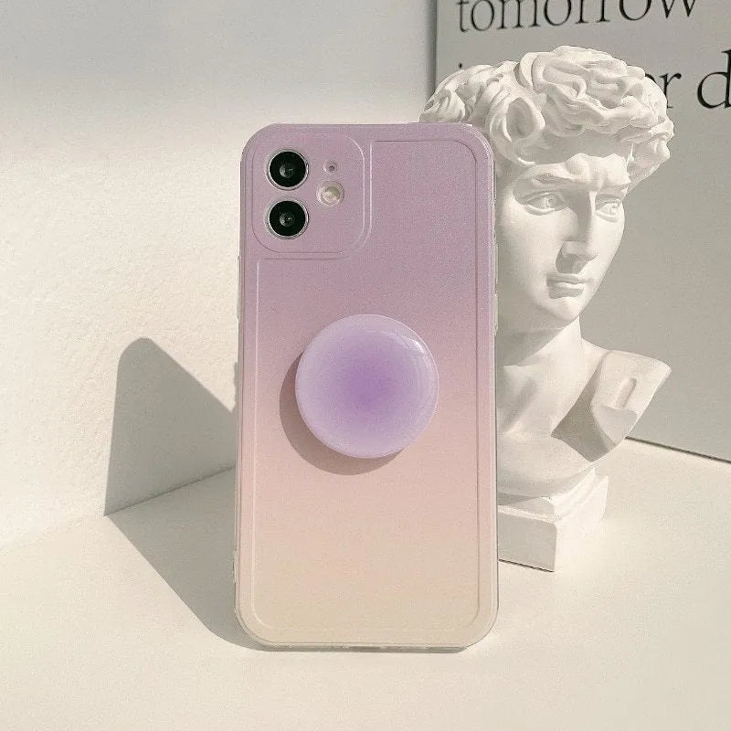 Yellow to purple gradient silicone protective case for iPhone on a table