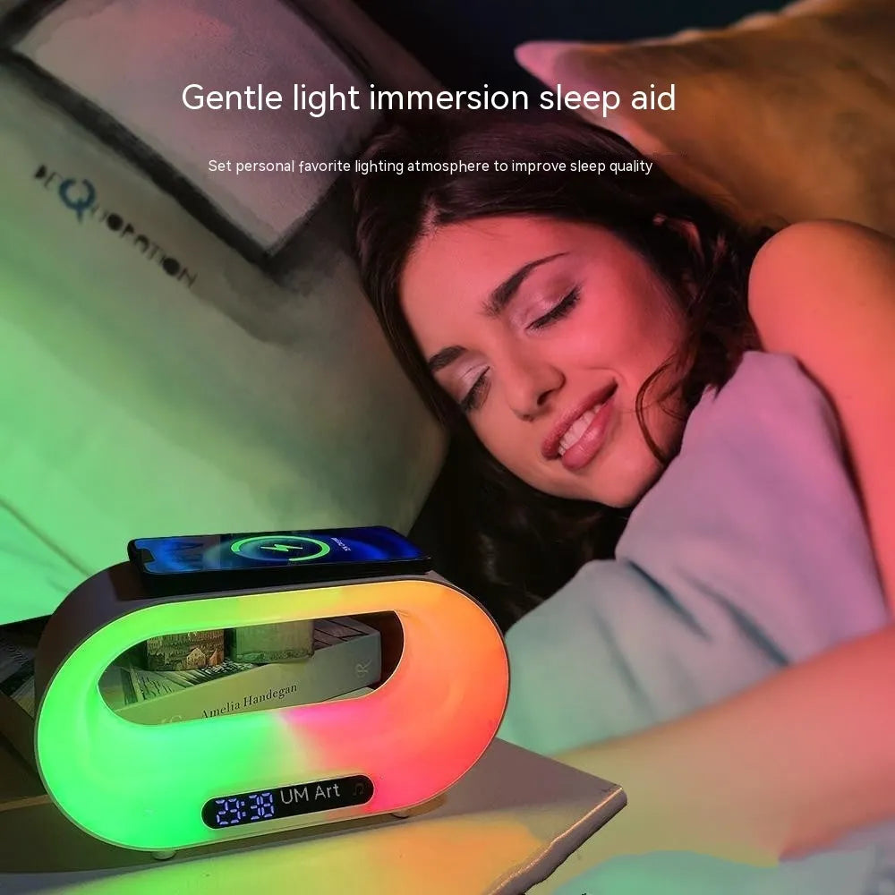 White 3-in-1 LED night light with wireless charging pad and alarm clock display