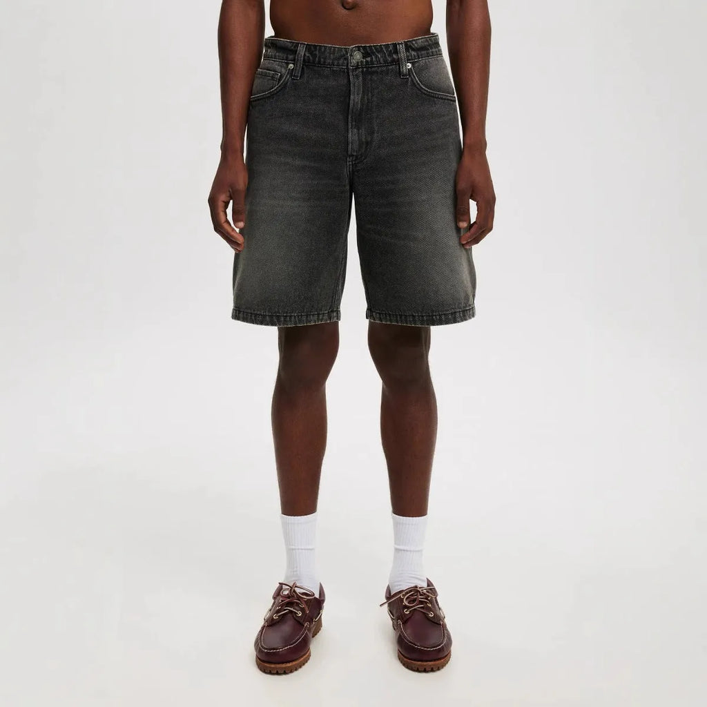 Men's loose fit straight-leg jeans trousers in light blue, black, and grey cotton denim.