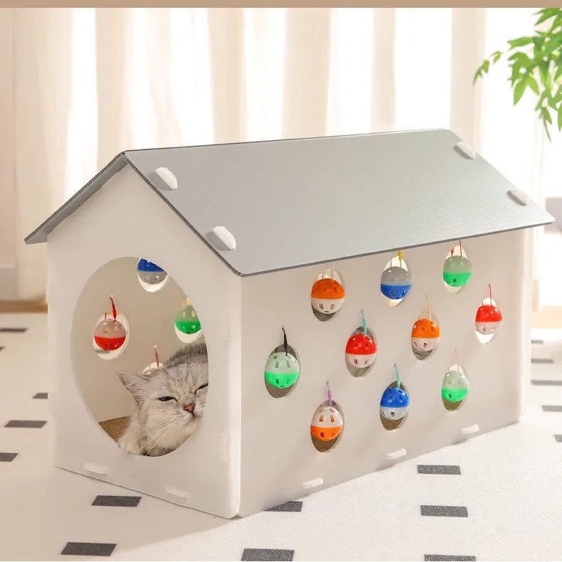 Integrated plastic cat scratch board nest with a tunnel and a hanging bell ball toy.