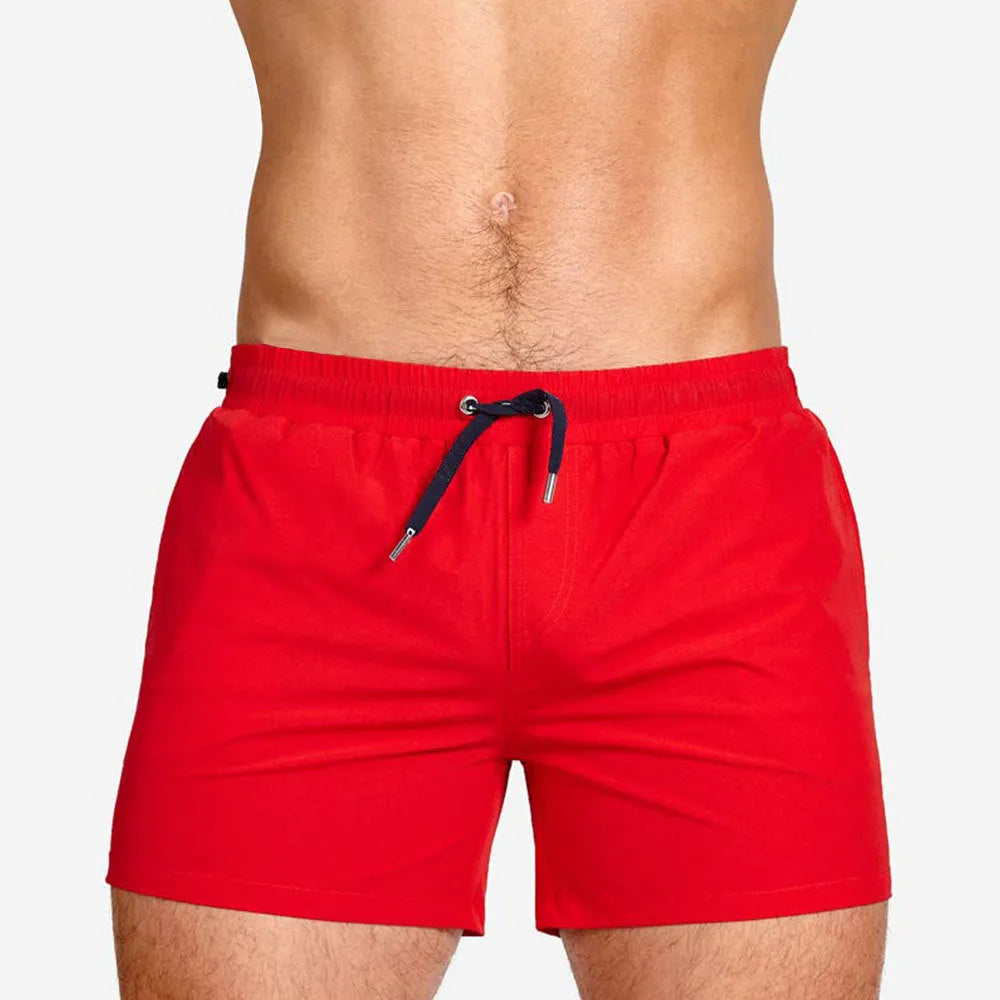 Mesh lining swimming sports shorts in polyester fabric available in six colours with size options