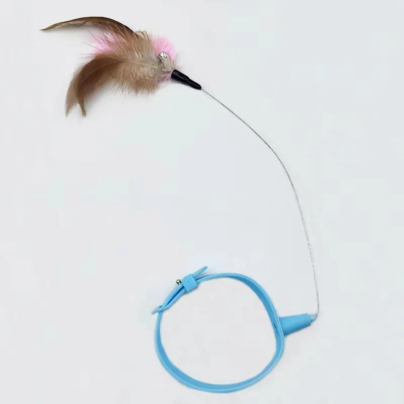 Blue adjustable cat collar with attached feather wand toy and small bell