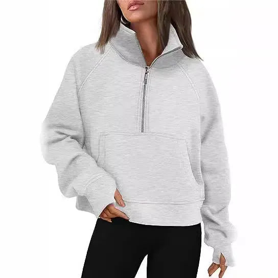 Women's loose lapel fleece-lined sweater in a solid colour showing raglan sleeve design