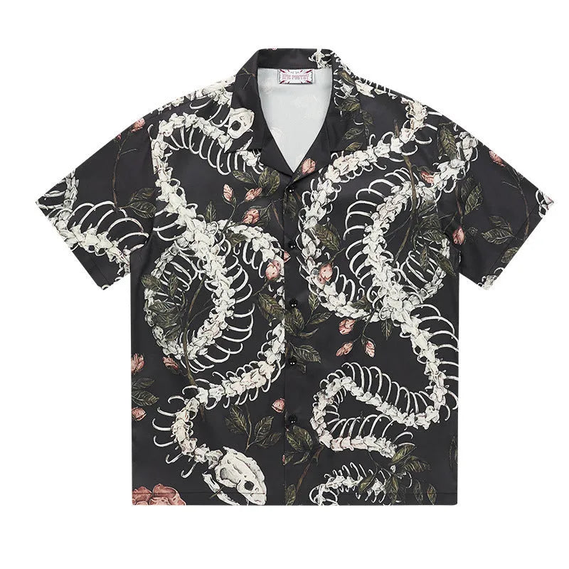 Short sleeve Cuban collar shirt featuring a printed snake bone and flower pattern in a loose fit.