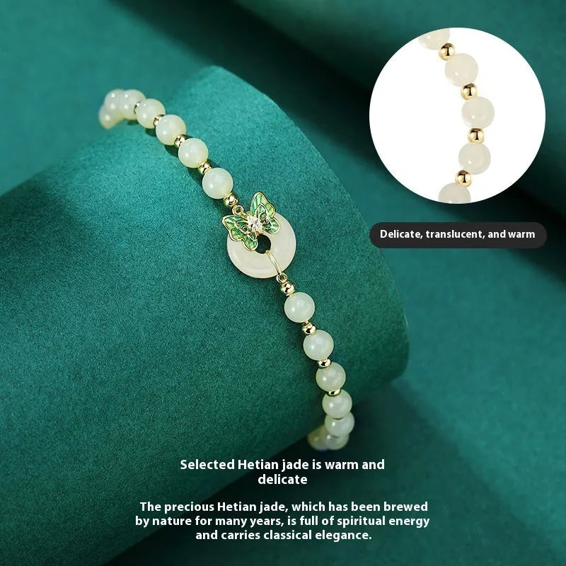 Cyan Hetian jade bracelet for women with a sterling silver butterfly inlay