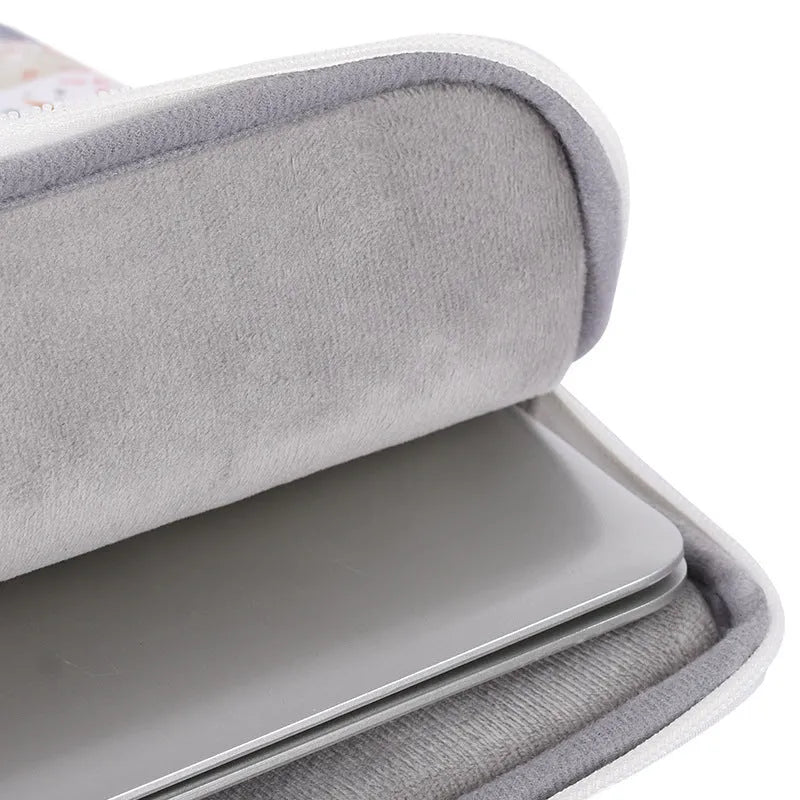 White waterproof PU leather 14 inch laptop inner bag showing its slim sleeve design.