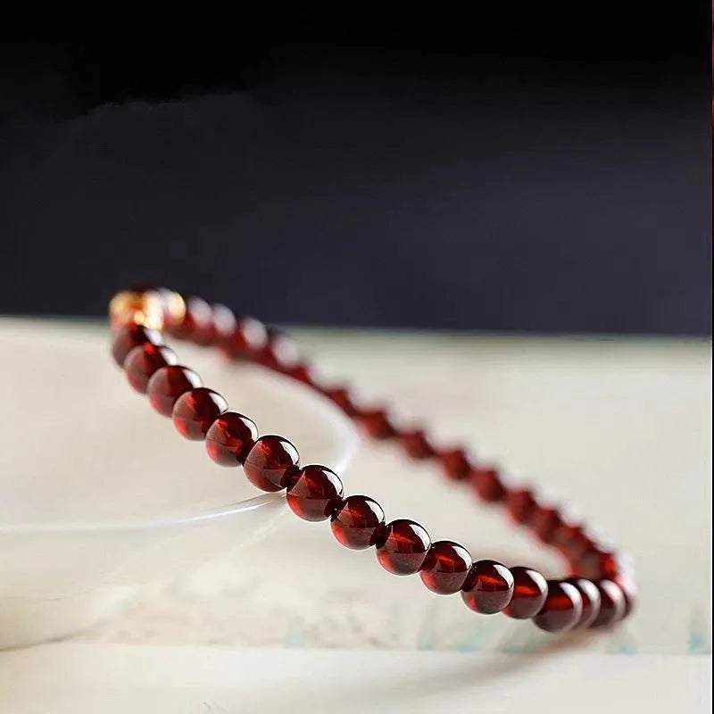 Retro wine red glass bead bracelet for women in new Chinese style design