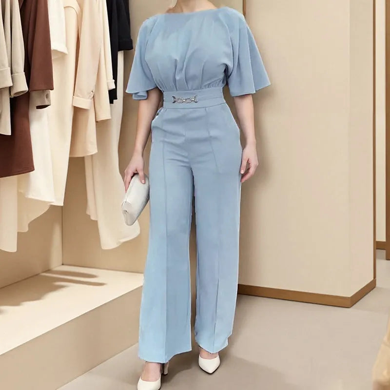 Blue polyester men's two-piece suit with trousers and long-sleeve jacket on hanger