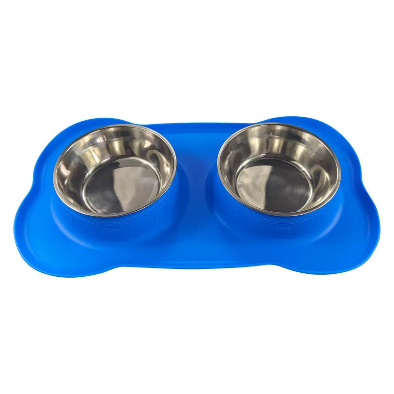 Large silicone double dog bowl with stainless steel inserts in blue colour showing two separate feeding compartments