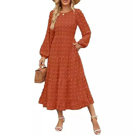 Women's beige high waist autumn dress with long ruffle sleeves, round neck.