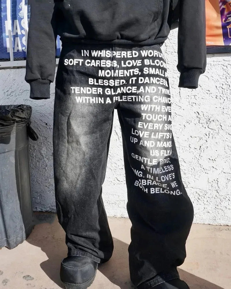 Man wearing loose fit black wide leg cotton casual trousers