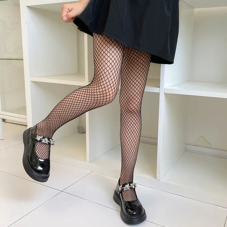 Women's black and white mesh stockings showing large, medium, and small pattern examples.