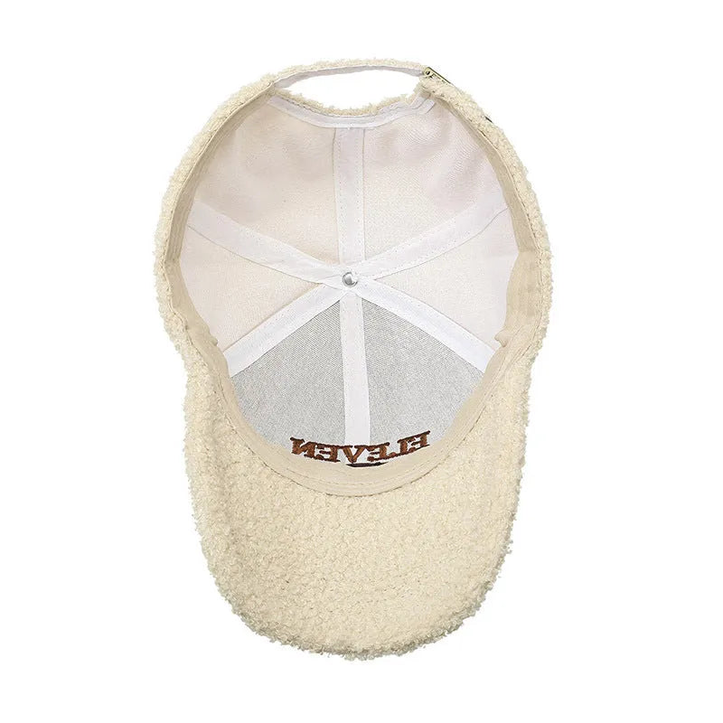 Winter lambskin baseball cap with adjustable strap in seven colour options