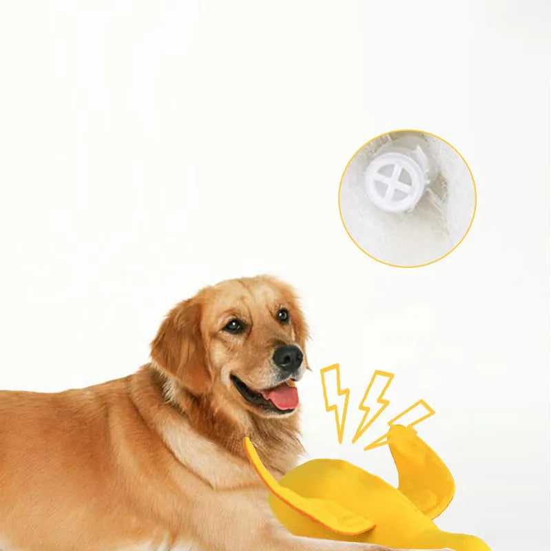Yellow teddy duck dog toy with food leak openings for treat dispensing during training and play