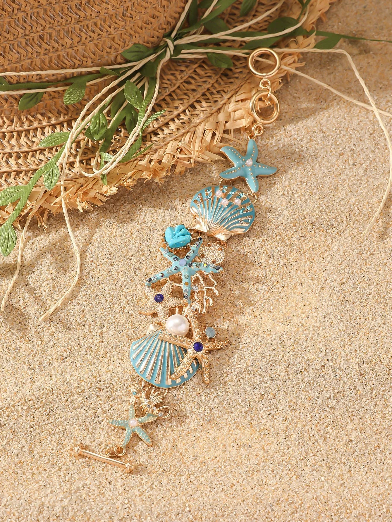 Alloy boat anchor and starfish bracelet for women in turquoise, red, or blue.