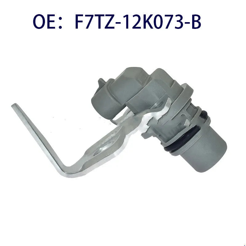 Ford camshaft position sensor part F7TZ12K073B on a plain background.