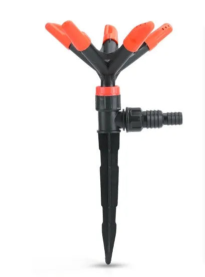 Orange plastic garden insert sprinkler with rotating water spray nozzle, 14x26.5cm