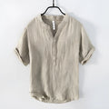 Retro-style solid colour linen pullover top with short sleeves and a striped pattern.