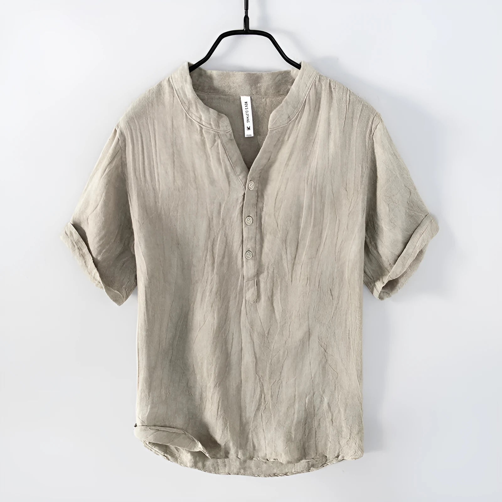 Retro-style solid colour linen pullover top with short sleeves and a striped pattern.