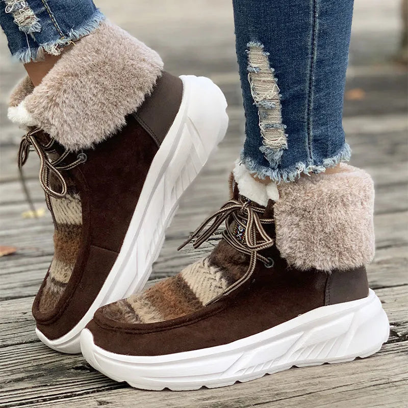Beige women's lace-up mid-top snow boots with suede upper and thick rubber sole.