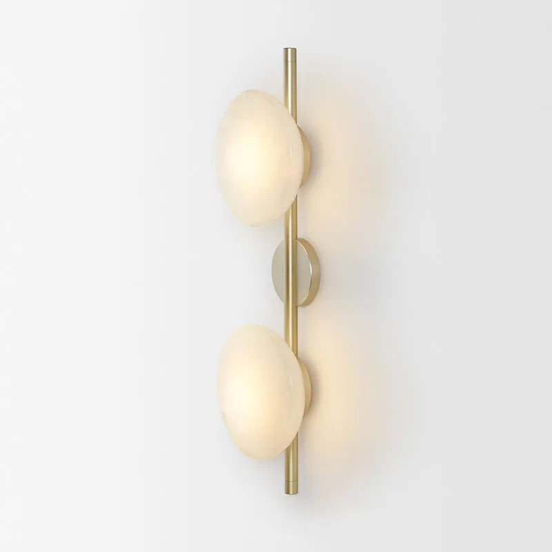 Bedside hotel wall lamp with iron construction and choice of glass shades including long brush holder style