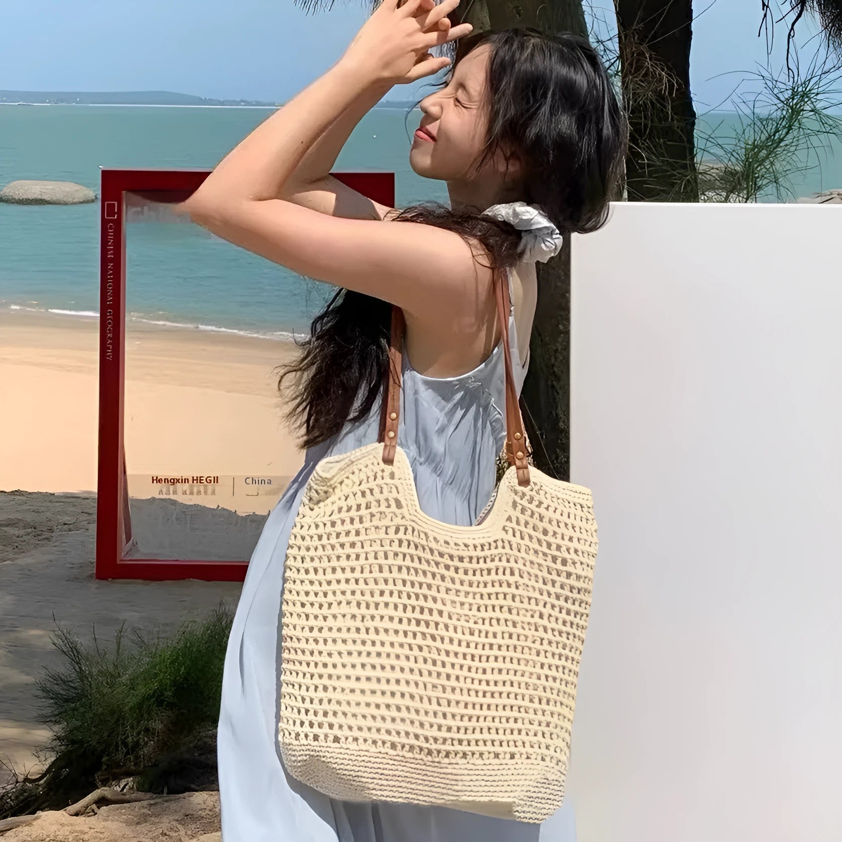 Beige woven cotton linen shoulder bag with spacious interior for beach holidays