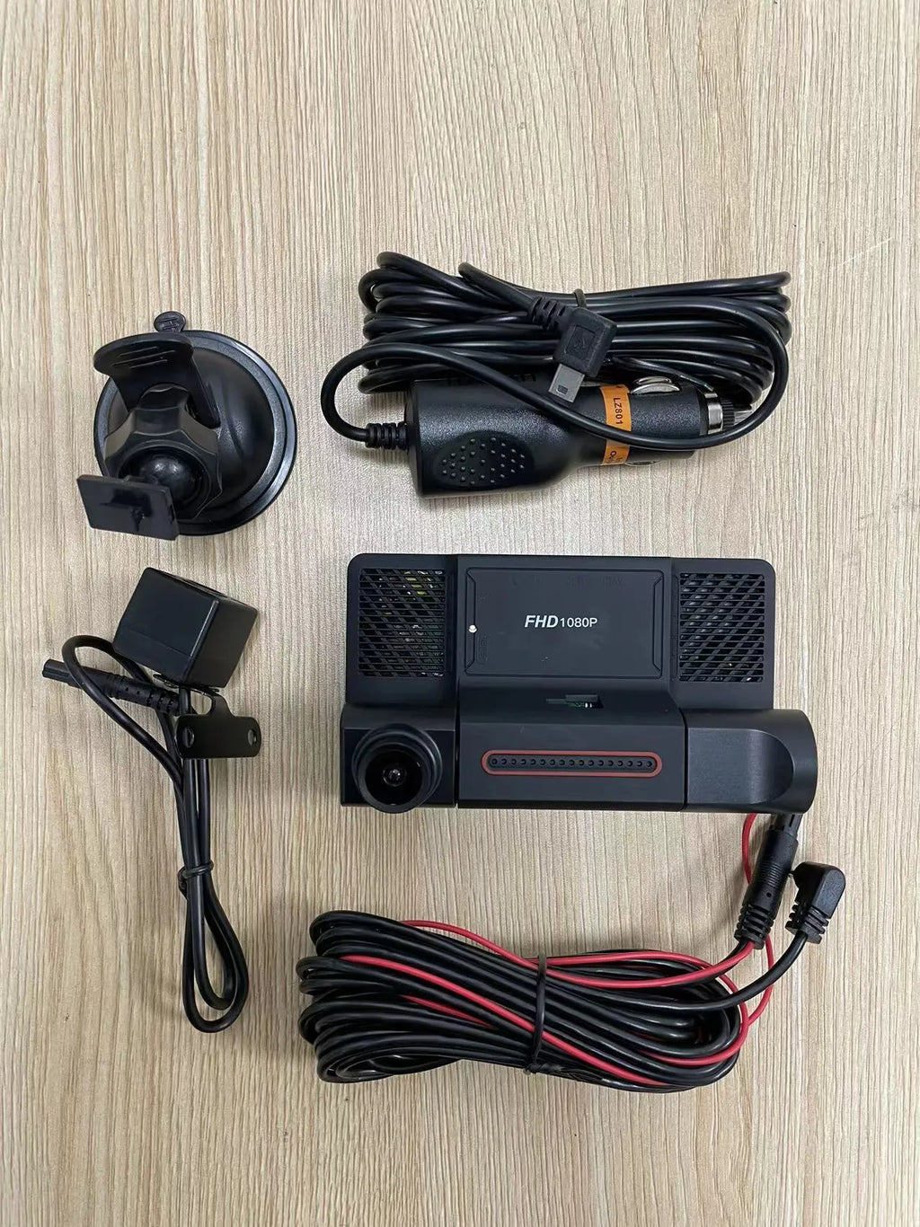Black three-lens dashcam with 4-inch touch screen for front and rear car recording